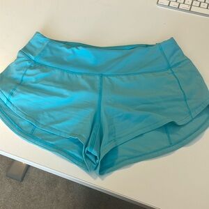 size 2 lululemon speed up low-rise 2.5 in electric turquoise